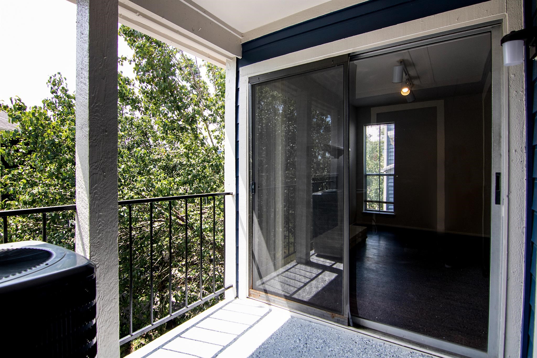 18519 Egret Bay Boulevard, Unit 1708 Webster, TX 77058 - Photo 19 of 27 a view of a glass door with a balcony from a room