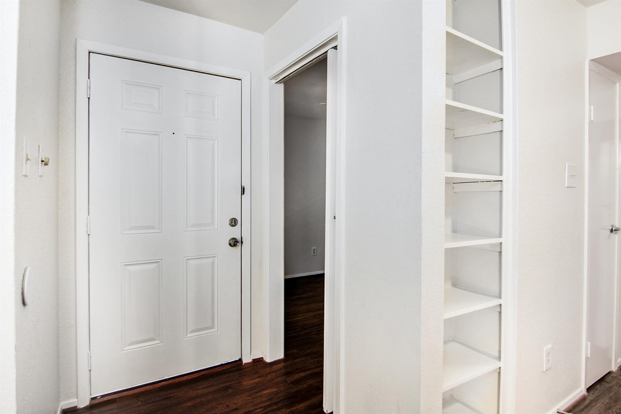 18519 Egret Bay Boulevard, Unit 1708 Webster, TX 77058 - Photo 2 of 27 a view of an empty walk in closet