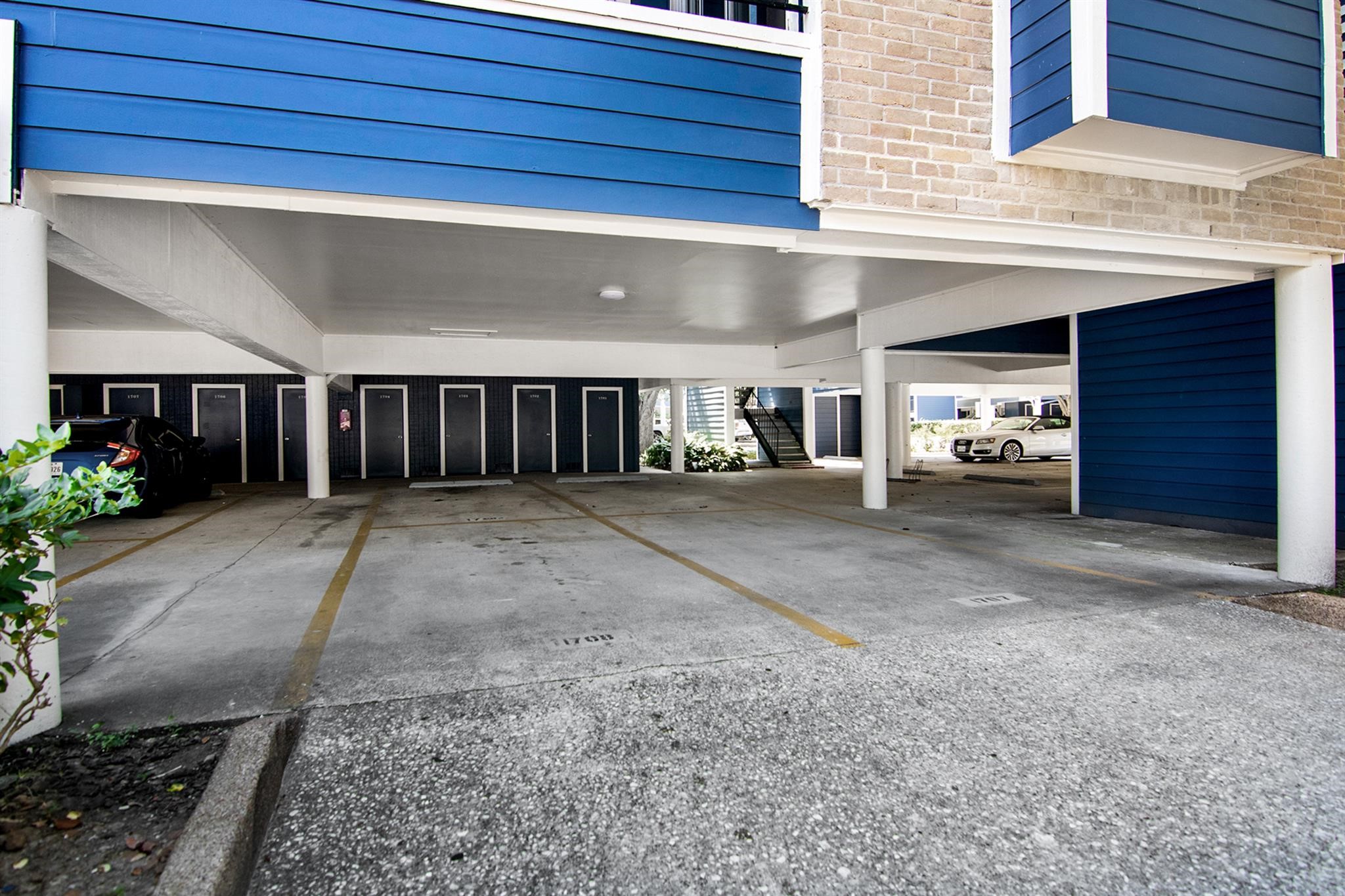 18519 Egret Bay Boulevard, Unit 1708 Webster, TX 77058 - Photo 21 of 27 a view of a car garage