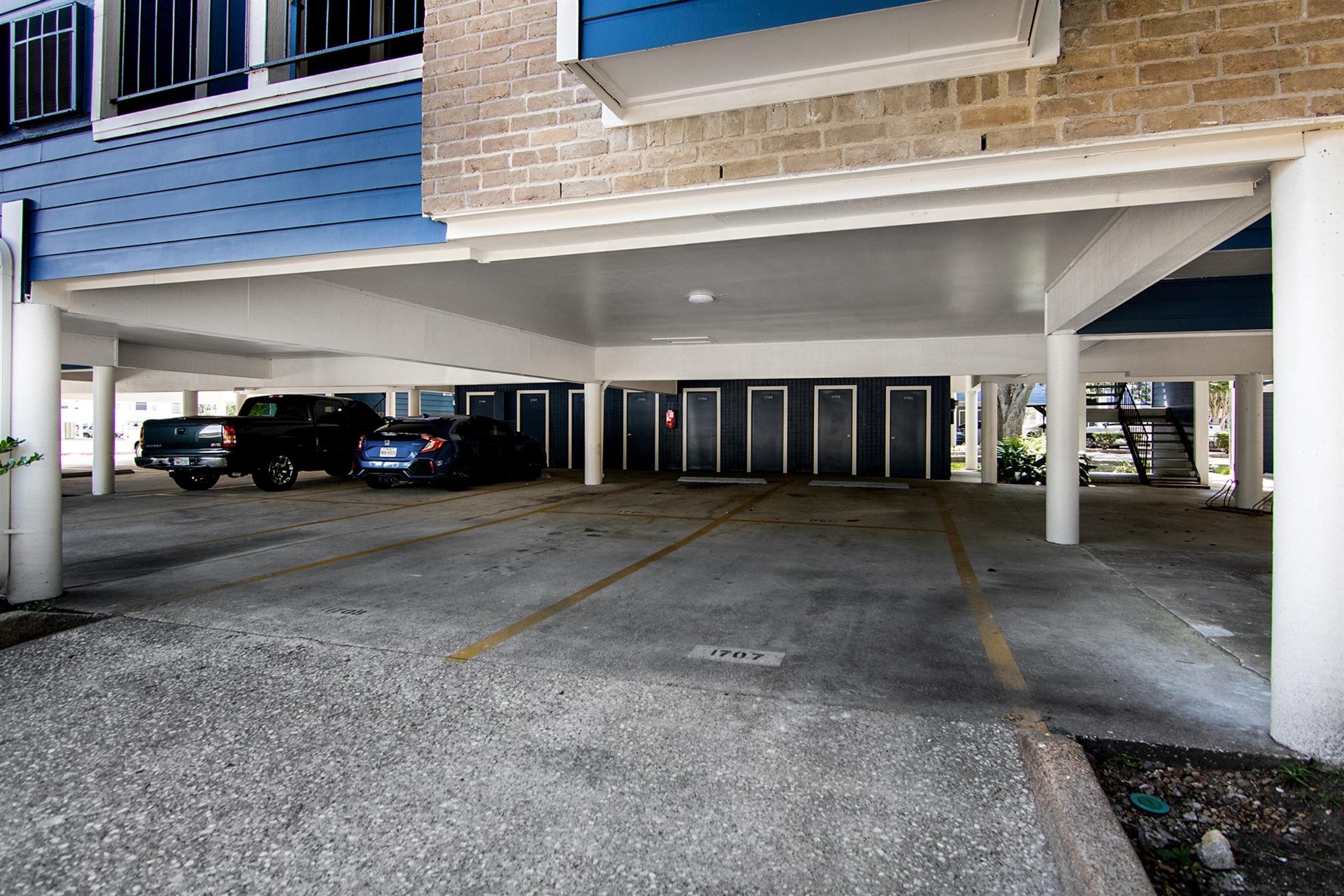 18519 Egret Bay Boulevard, Unit 1708 Webster, TX 77058 - Photo 22 of 27 a view of a car garage
