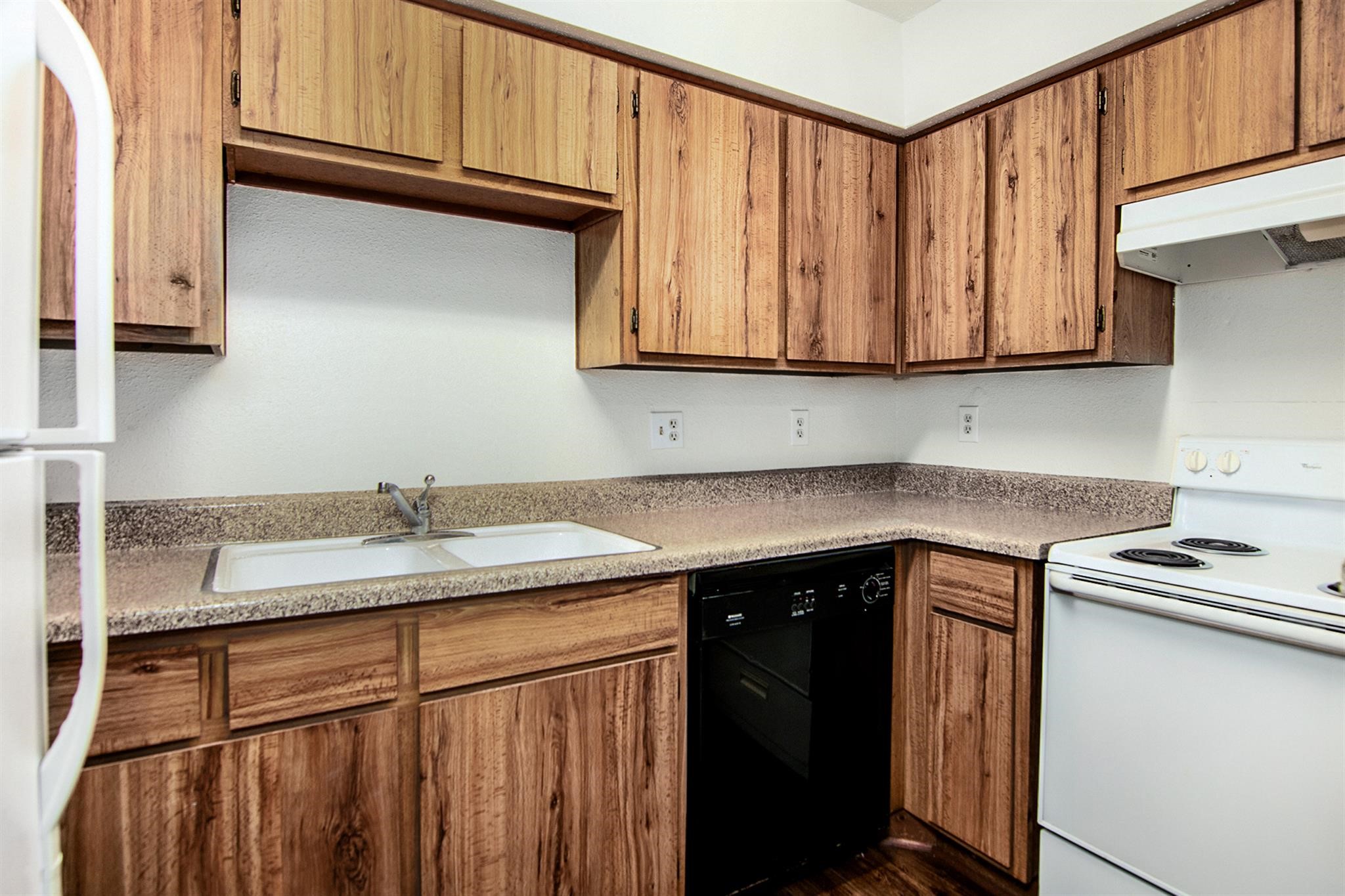 18519 Egret Bay Boulevard, Unit 1708 Webster, TX 77058 - Photo 8 of 27 a kitchen with stainless steel appliances granite countertop a sink stove and cabinets