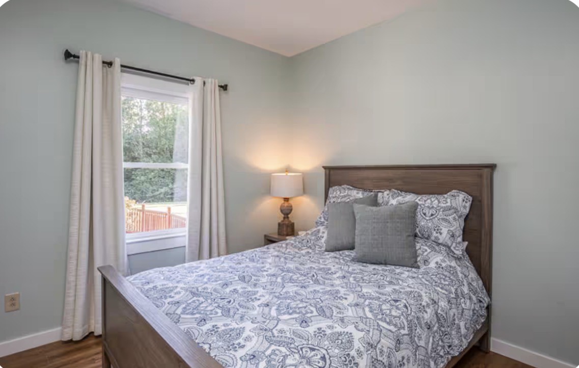 1437 Dividing Ridge Road Goodlettsville, TN 37072 - Photo 13 of 36 a bedroom with a large bed and a window