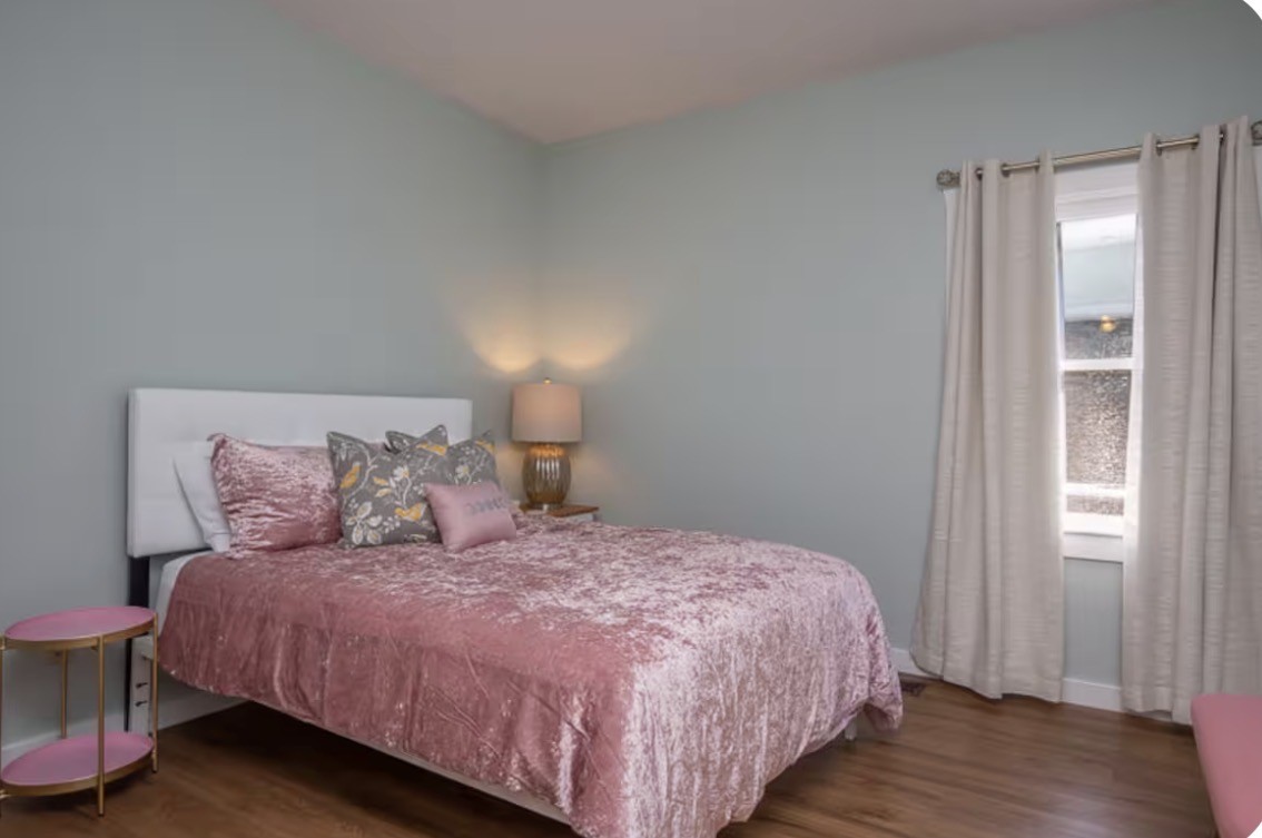 1437 Dividing Ridge Road Goodlettsville, TN 37072 - Photo 14 of 36 a large bed sitting in a bedroom next to a window and a lamp