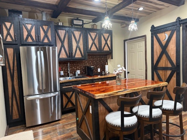 1437 Dividing Ridge Road Goodlettsville, TN 37072 - Photo 19 of 36 a kitchen with a table chairs and a refrigerator