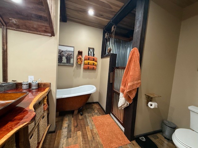 1437 Dividing Ridge Road Goodlettsville, TN 37072 - Photo 30 of 36 a bathroom with a sink a toilet and a shower