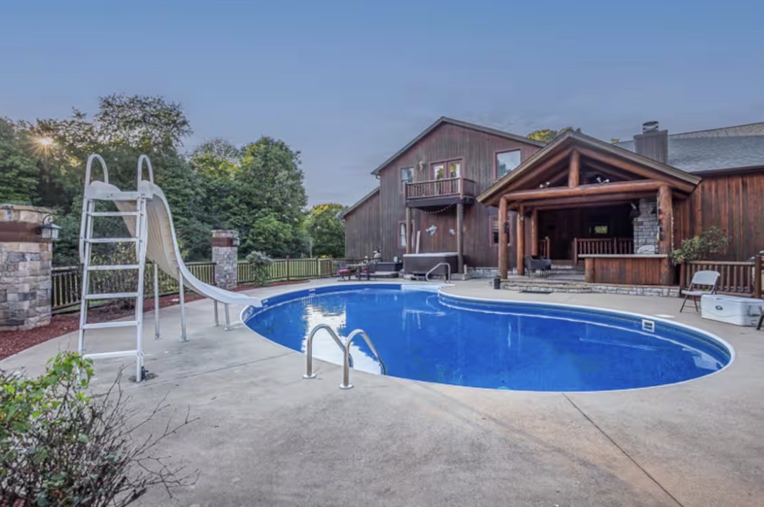 1437 Dividing Ridge Road Goodlettsville, TN 37072 - Photo 36 of 36 a view of a house with swimming pool and sitting area