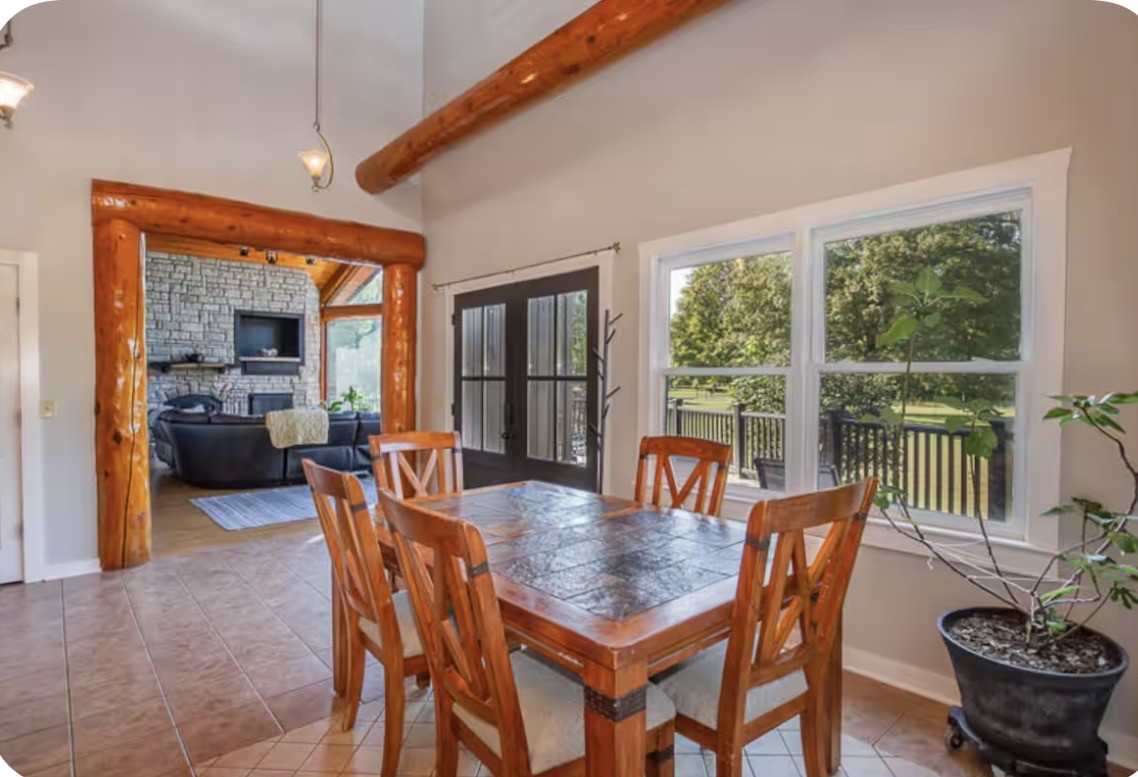 1437 Dividing Ridge Road Goodlettsville, TN 37072 - Photo 8 of 36 a dining room with furniture window and wooden floor