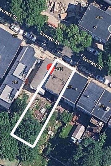 an aerial view of a city with lots of residential buildings