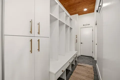 a view of a hallway with closet