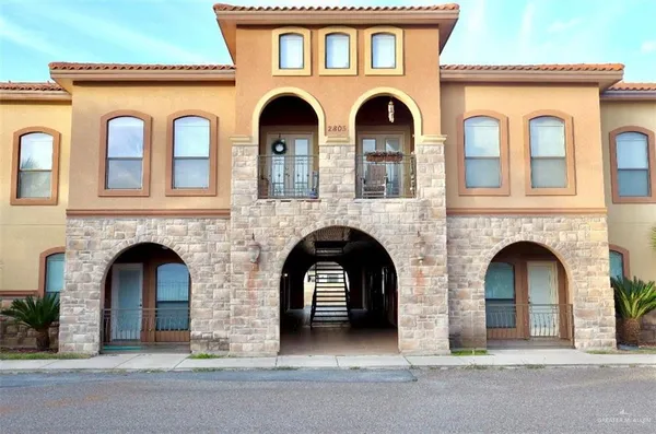 a front view of a house with a door