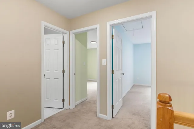 a kitchen with stainless steel appliances granite countertop a refrigerator a sink and a stove