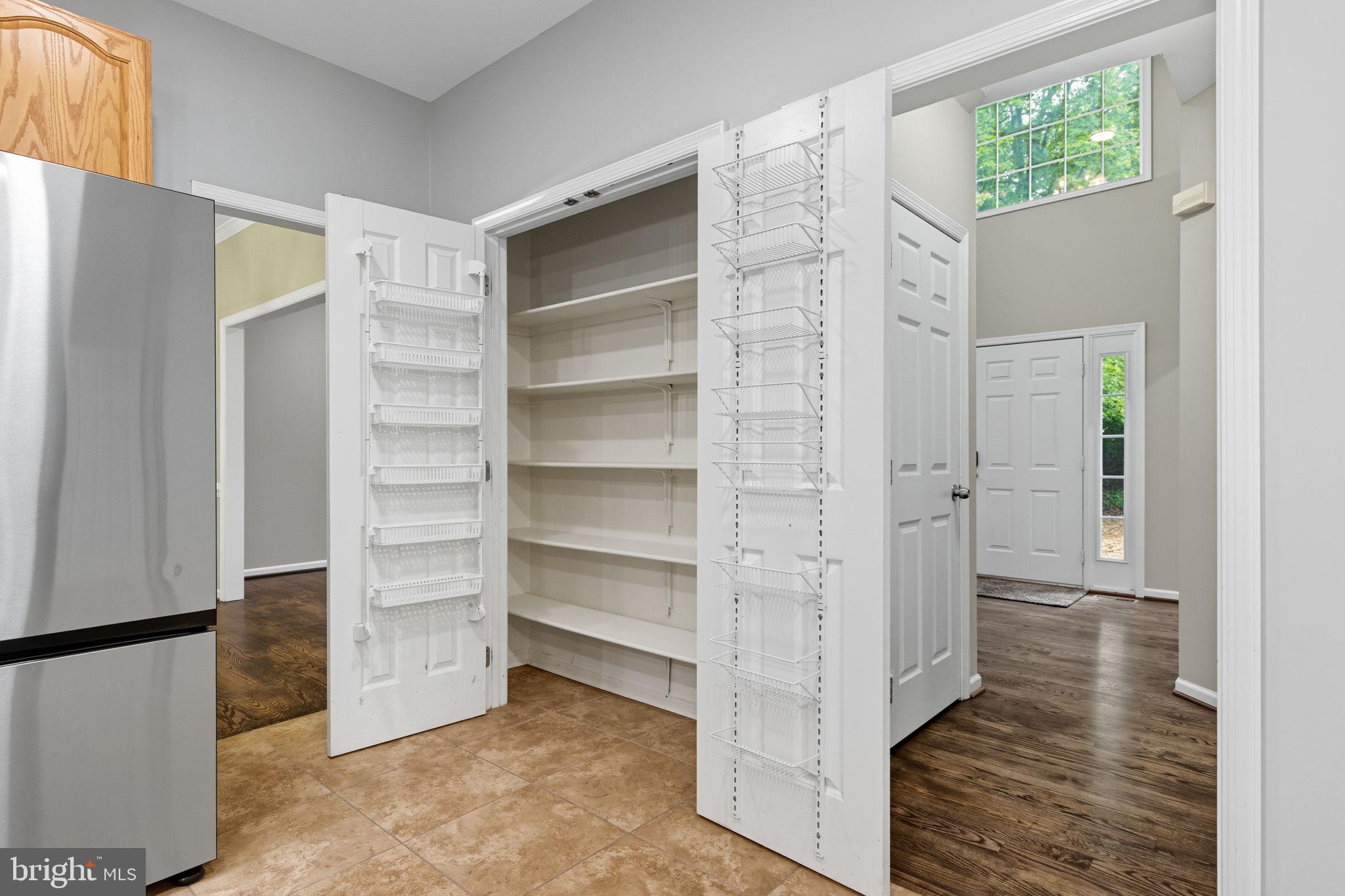 6363 Yates Ford Road Manassas, VA 20111 - Photo 37 of 67 a view of walk in closet with empty racks