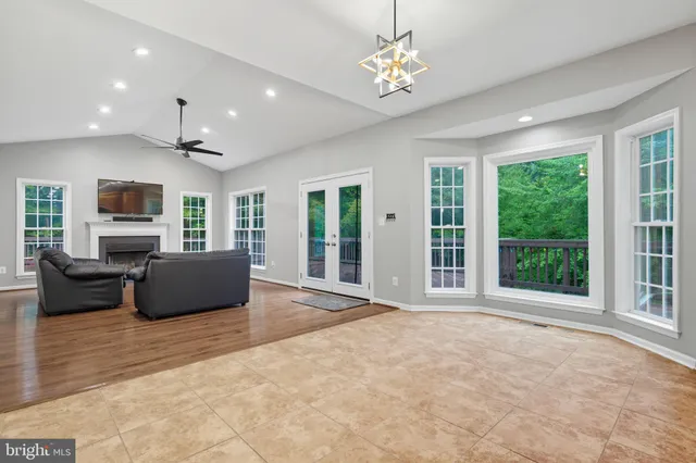 a balcony with view of outdoor space