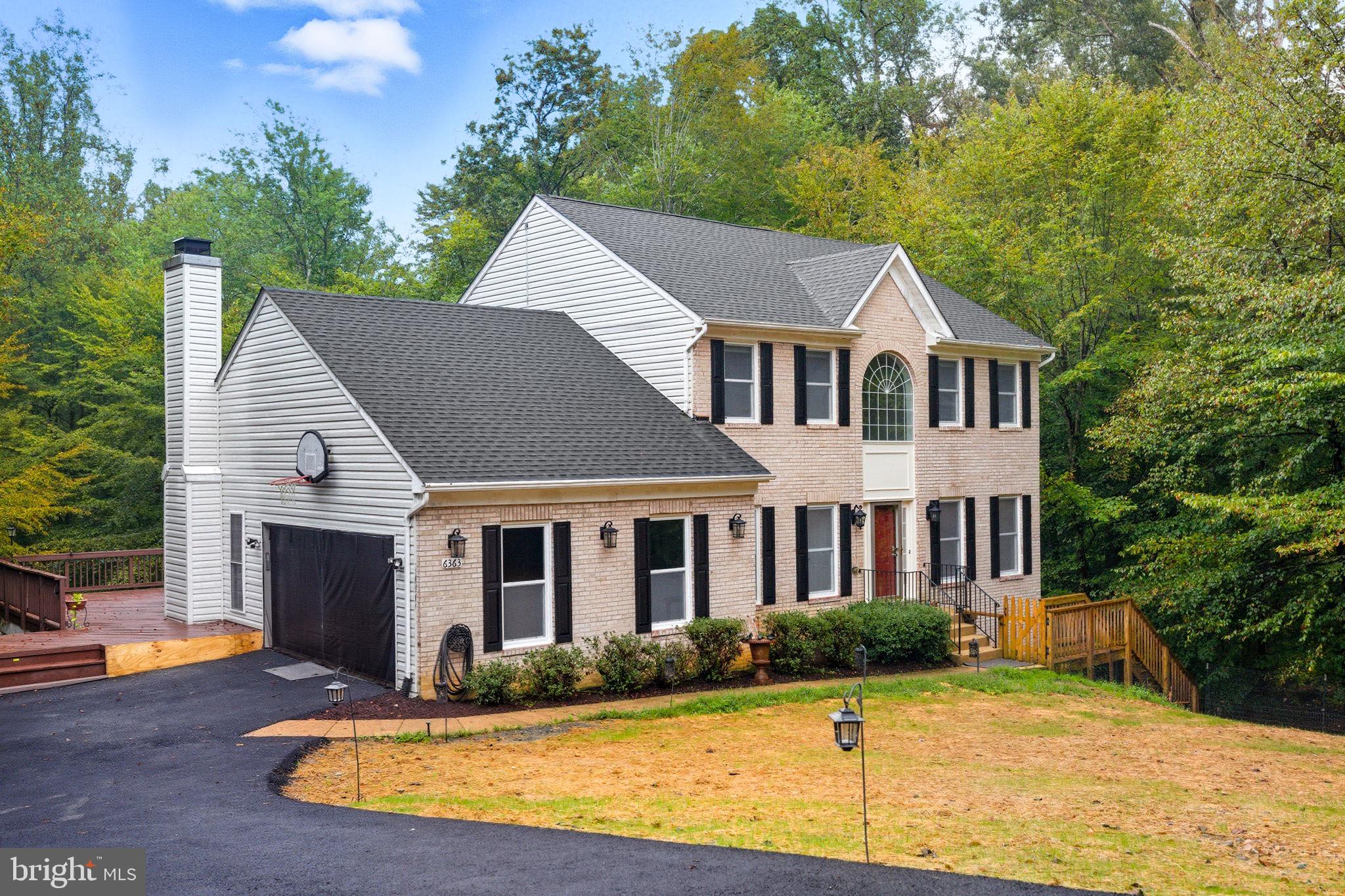 6363 Yates Ford Road Manassas, VA 20111 - Photo 63 of 67 a front view of a house with a yard