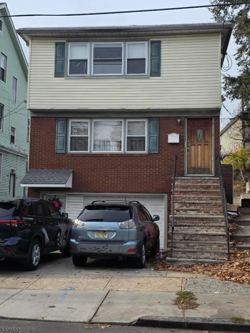a car parked in front of a house