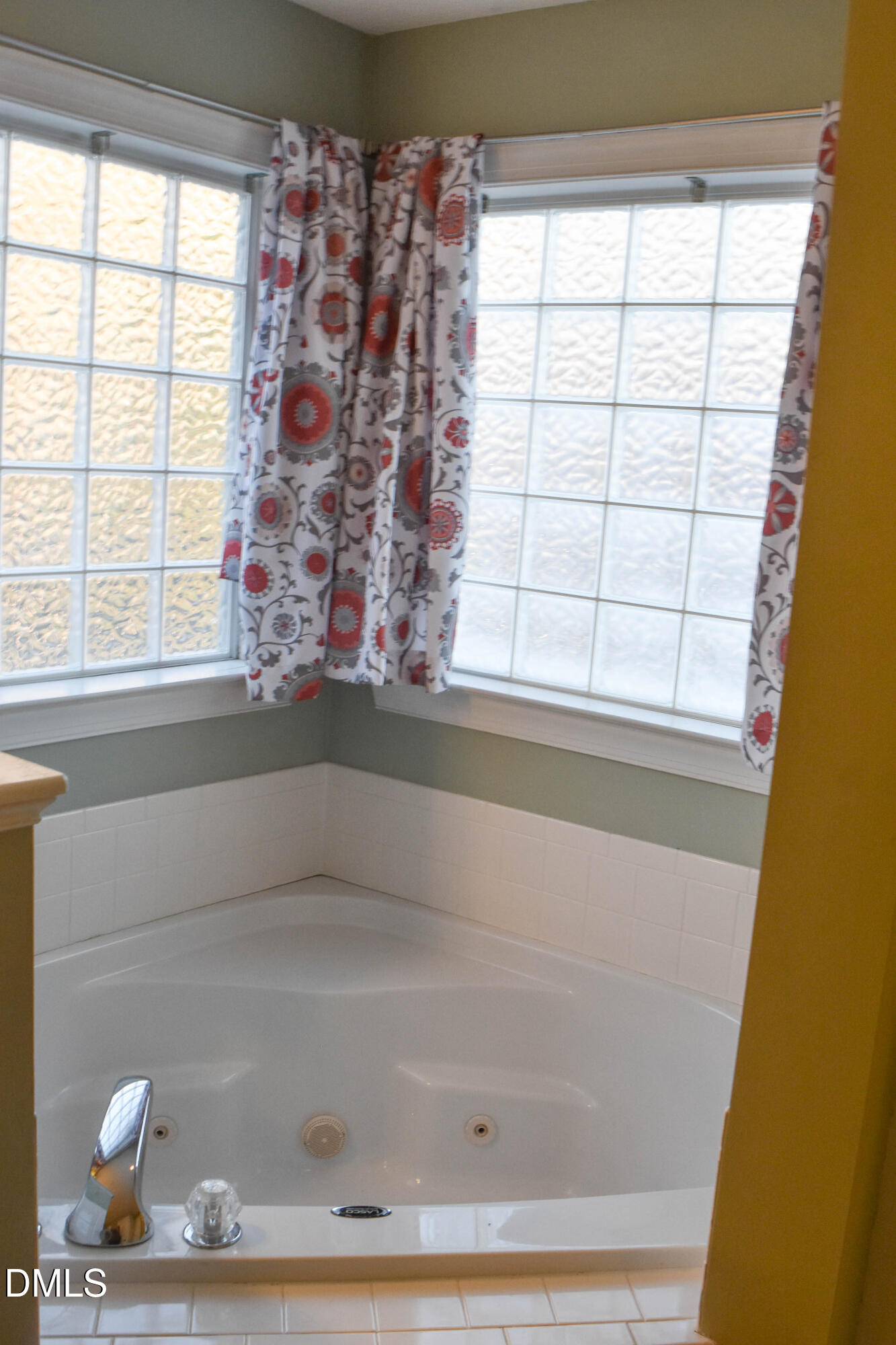 5908 Deep Spring Circle Wake Forest, NC 27587 - Photo 24 of 51 a bath tub sitting next to a window