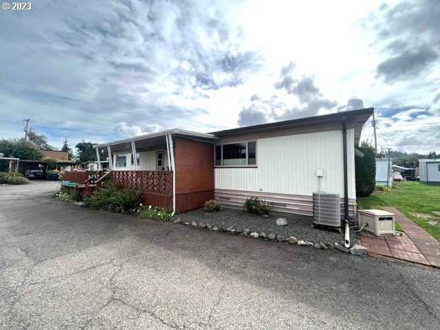 3998 Franklin Boulevard Eugene, OR 97403 - Photo 11 of 35 a backyard of a house with barbeque oven and outdoor seating