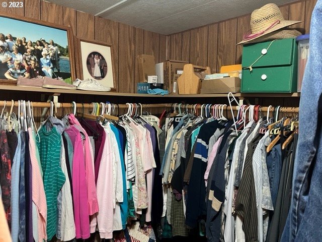 3998 Franklin Boulevard Eugene, OR 97403 - Photo 24 of 35 a view of walk in closet with clothes and shoes