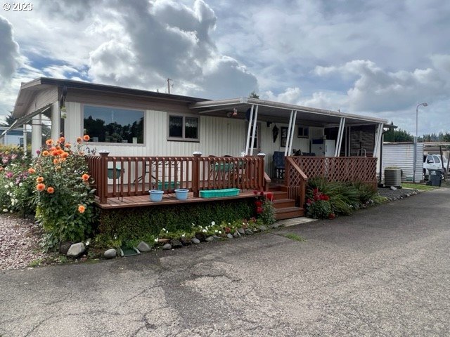 3998 Franklin Boulevard Eugene, OR 97403 - Photo 10 of 35 a view of a house with a yard and deck
