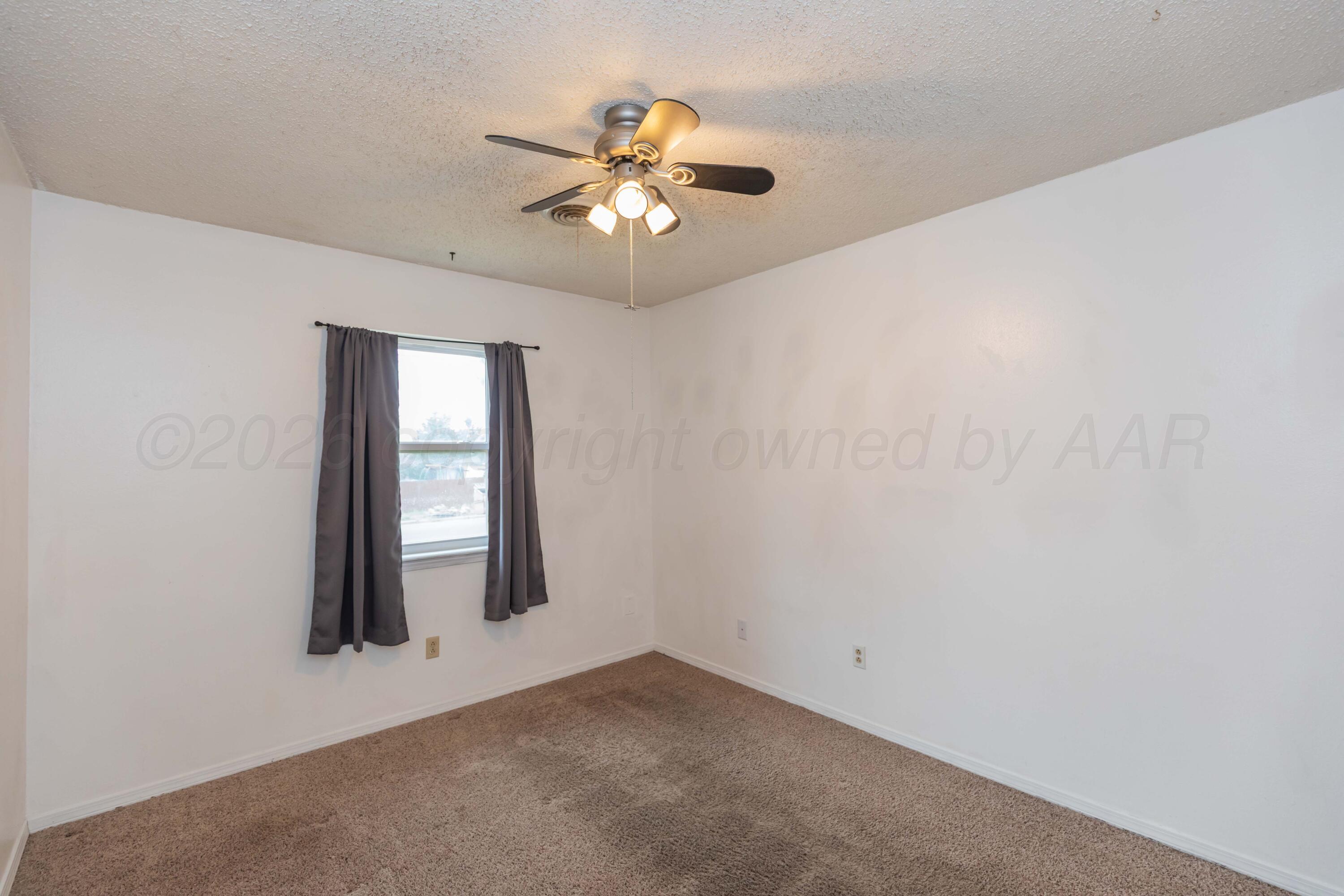 4202 Scotty Drive Amarillo, TX 79110 - Photo 24 of 33 BEDROOM 3 VIEW 2