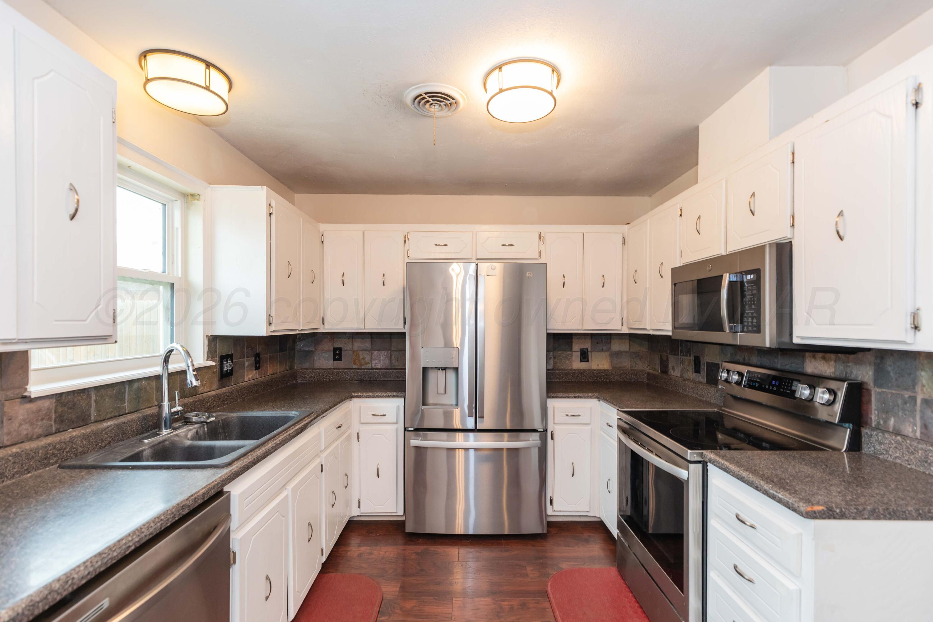4202 Scotty Drive Amarillo, TX 79110 - Photo 9 of 33 KITCHEN VIEW 1