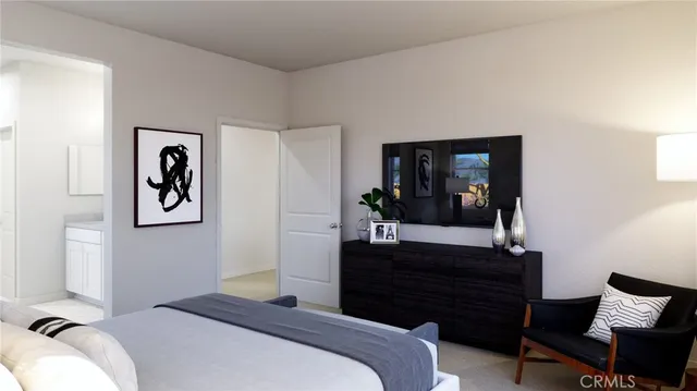 a bedroom with a bed and a dresser