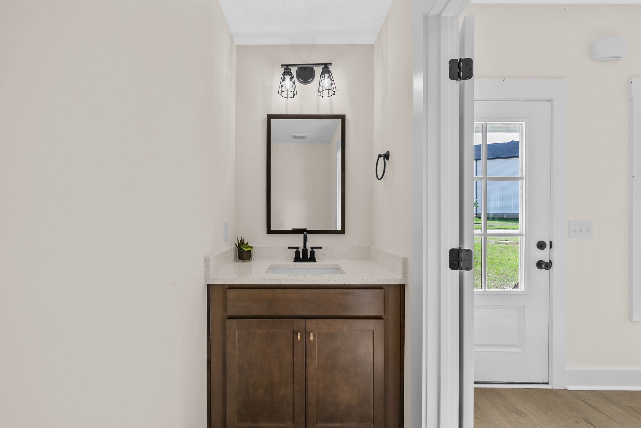 194 Dewberry Road Clarksville, TN 37042 - Photo 12 of 62 a bathroom with a sink and a mirror