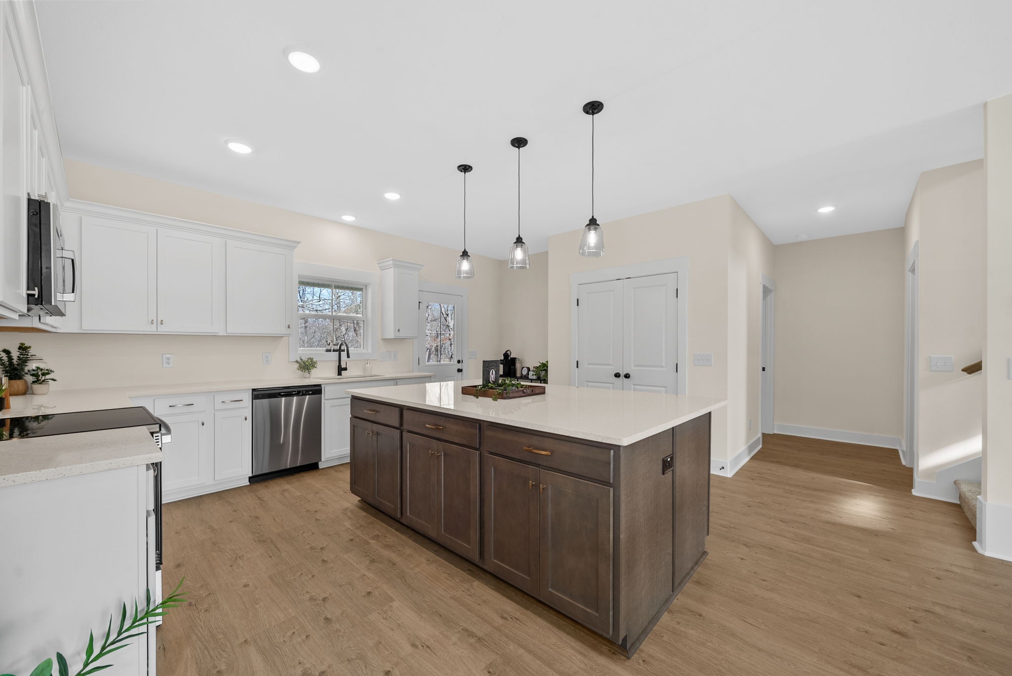 194 Dewberry Road Clarksville, TN 37042 - Photo 15 of 62 a kitchen with a sink stove and cabinets