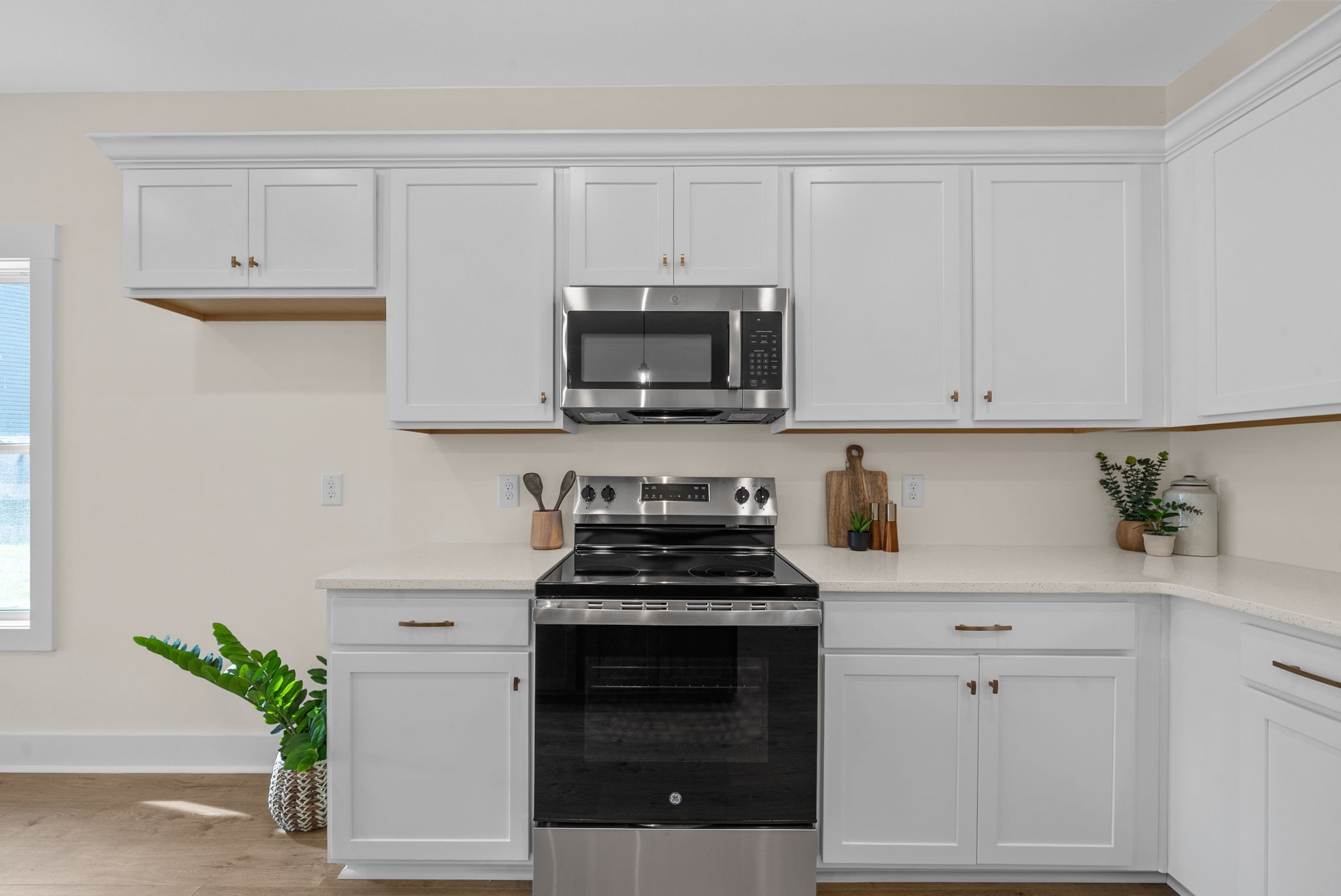 194 Dewberry Road Clarksville, TN 37042 - Photo 19 of 62 a kitchen with white cabinets and appliances