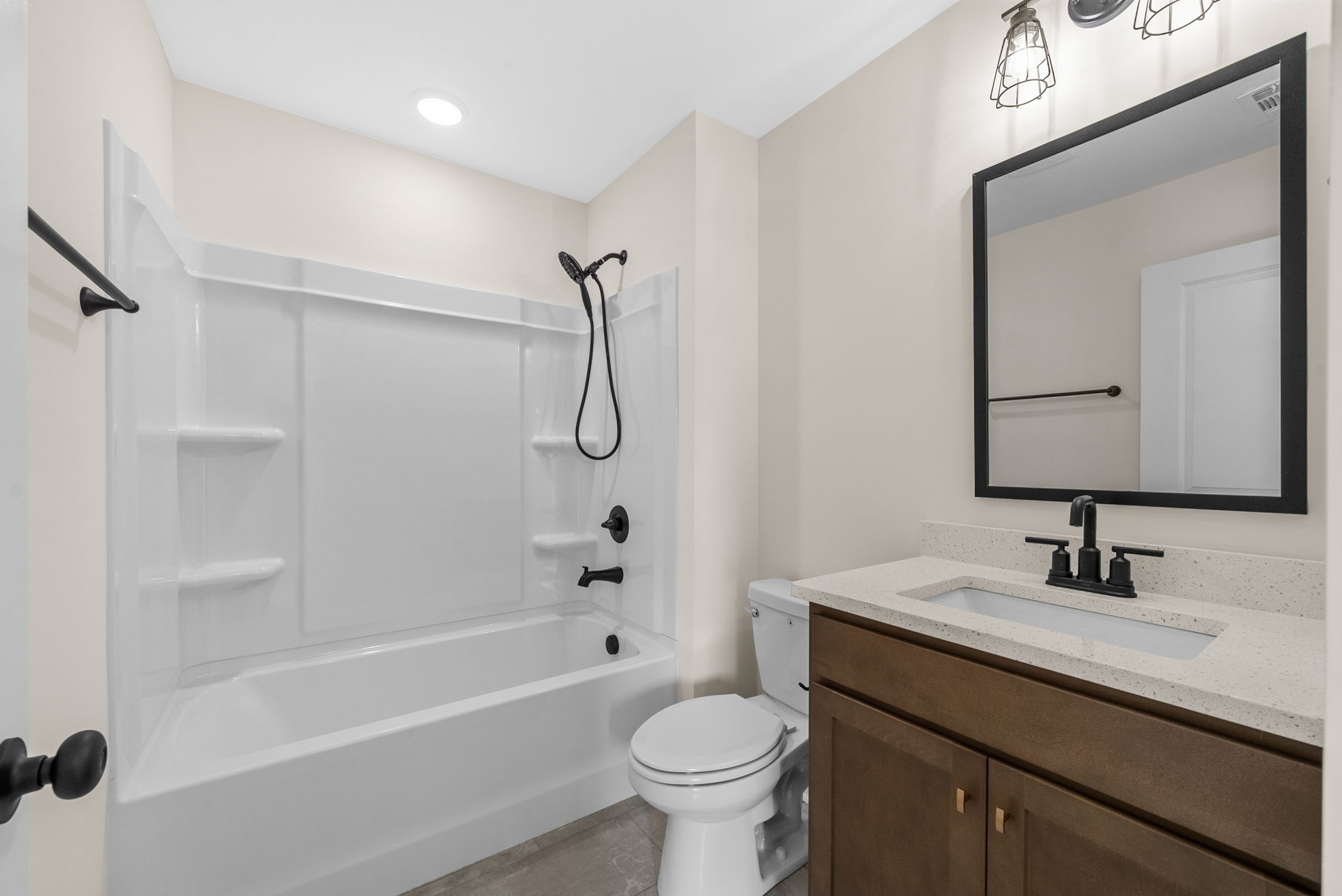 194 Dewberry Road Clarksville, TN 37042 - Photo 33 of 62 a bathroom with a sink a toilet and shower