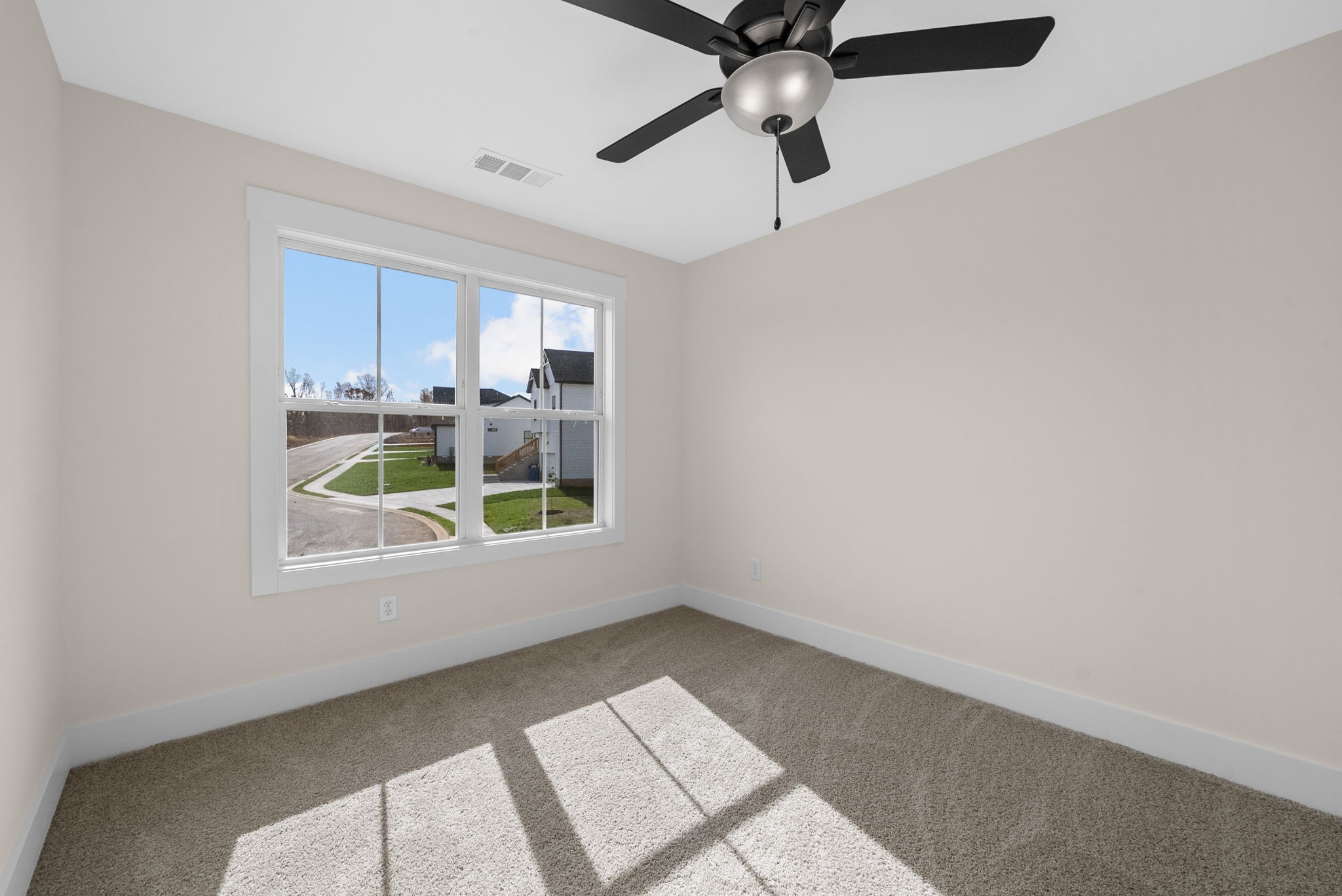 194 Dewberry Road Clarksville, TN 37042 - Photo 34 of 62 an empty room with windows and fan