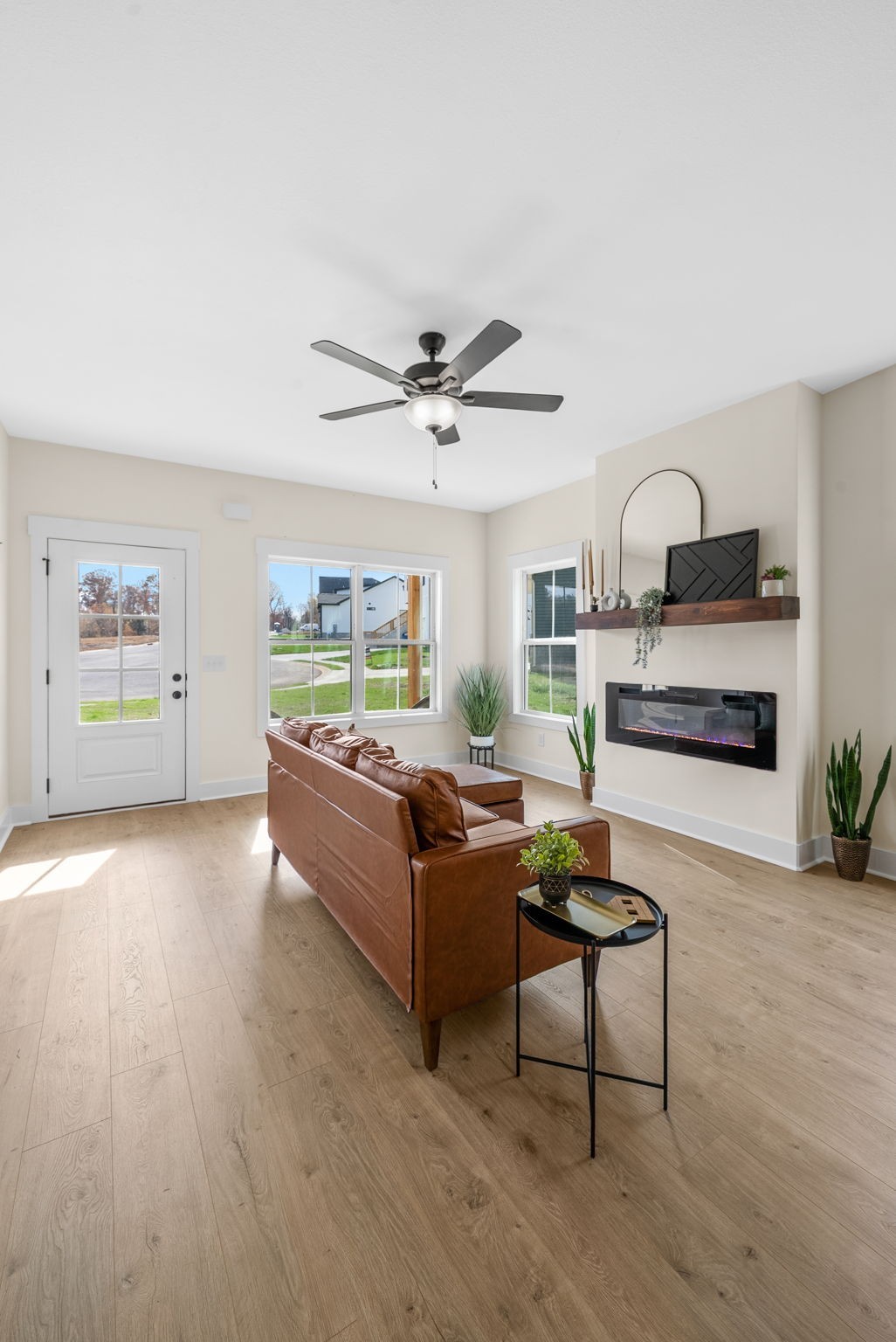 194 Dewberry Road Clarksville, TN 37042 - Photo 49 of 62 a living room with furniture and a wooden floor