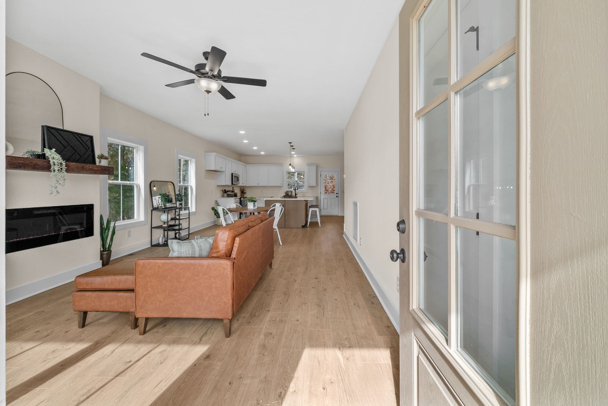 194 Dewberry Road Clarksville, TN 37042 - Photo 5 of 62 a living room with furniture and a flat screen tv