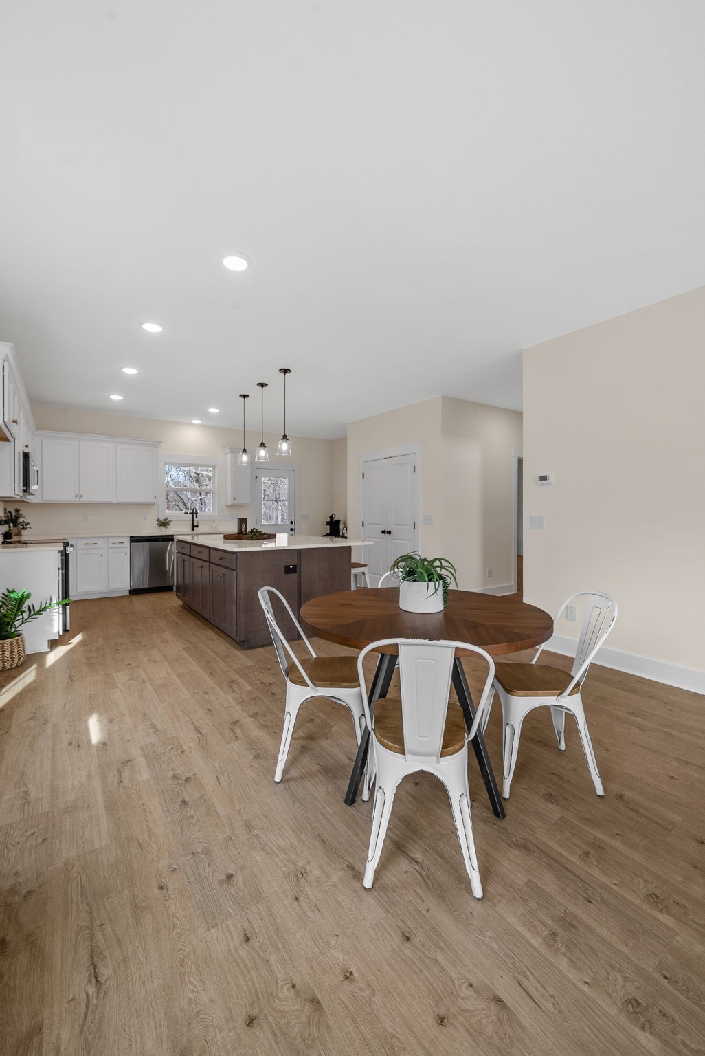 194 Dewberry Road Clarksville, TN 37042 - Photo 52 of 62 a dining room with a table and chairs