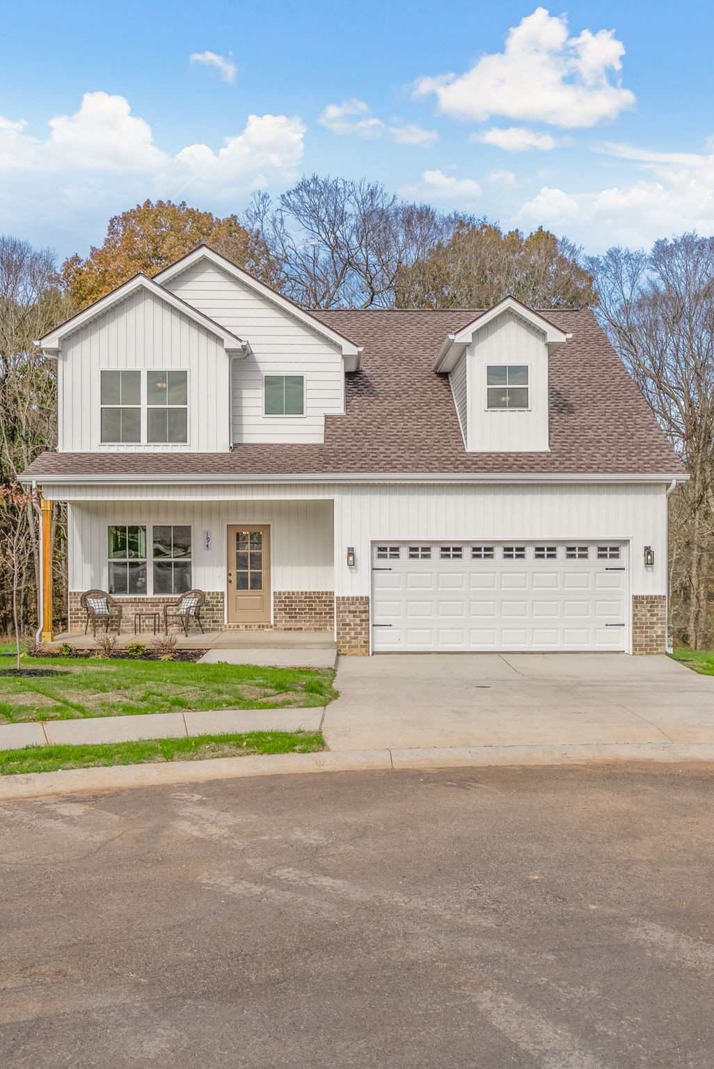 194 Dewberry Road Clarksville, TN 37042 - Photo 53 of 62 a view of white house with a big yard and large trees