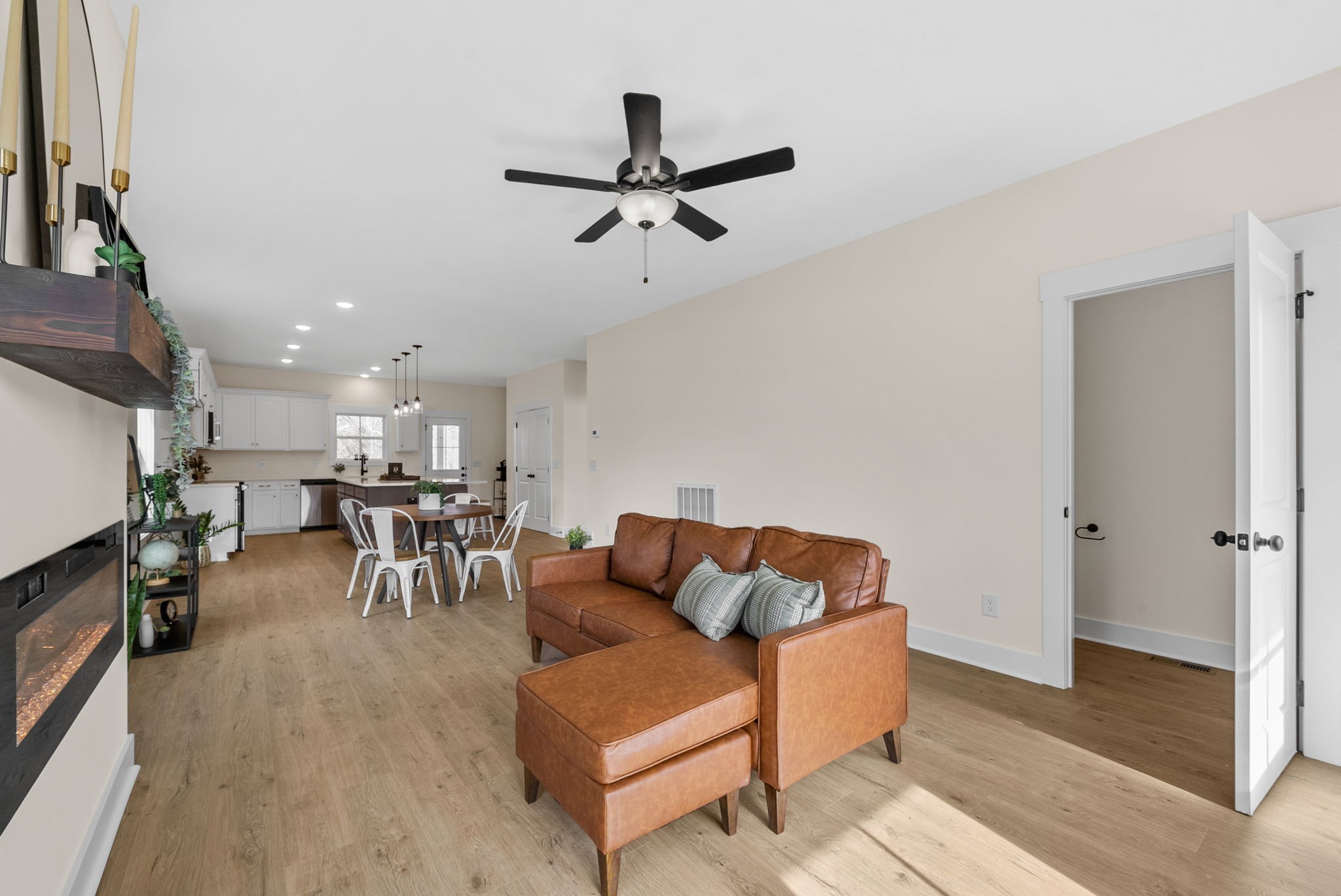 194 Dewberry Road Clarksville, TN 37042 - Photo 7 of 62 a living room with furniture and a view of kitchen