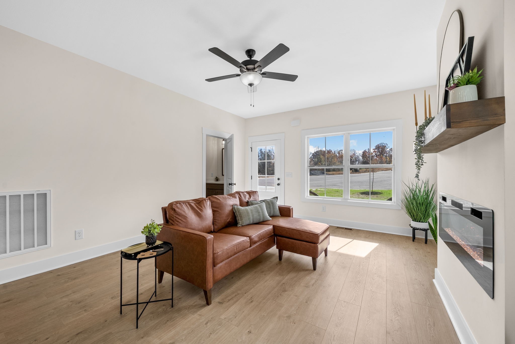 194 Dewberry Road Clarksville, TN 37042 - Photo 9 of 62 a living room with furniture and a large window