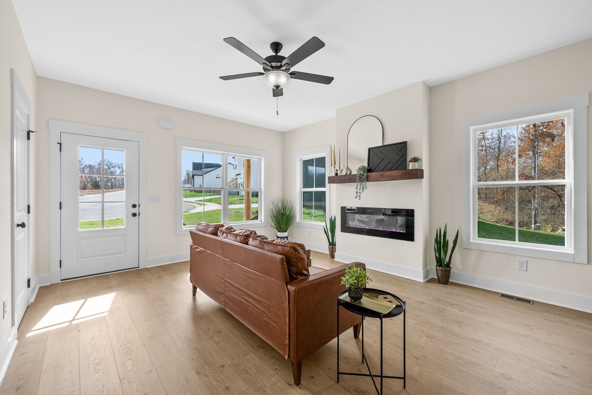 194 Dewberry Road Clarksville, TN 37042 - Photo 10 of 62 a living room with furniture and a fireplace
