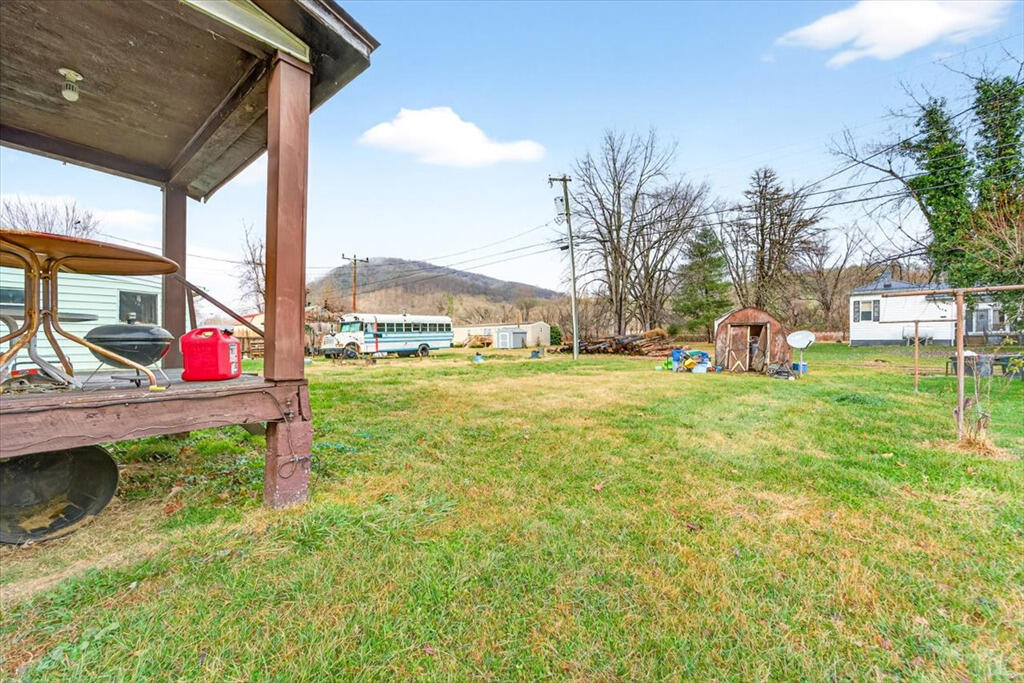 413 Commerce Avenue Iron Gate, VA 24422 - Photo 17 of 18 a childrens park with lots of swings and slides