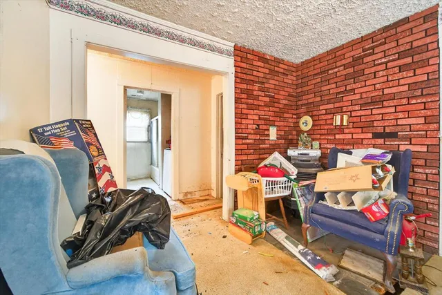 a room with furniture and a wooden floor