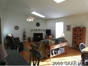 204 Rutledge Drive Waynesboro, VA 22980 - Photo 4 of 11 a living room with furniture a flat screen tv and a fireplace