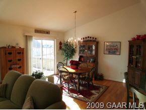 204 Rutledge Drive Waynesboro, VA 22980 - Photo 6 of 11 a living room with furniture a rug and a window
