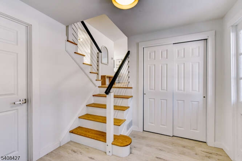 22 Glen Road Bridgewater, NJ 08805 - Photo 12 of 48 a room that has a rug and white walls