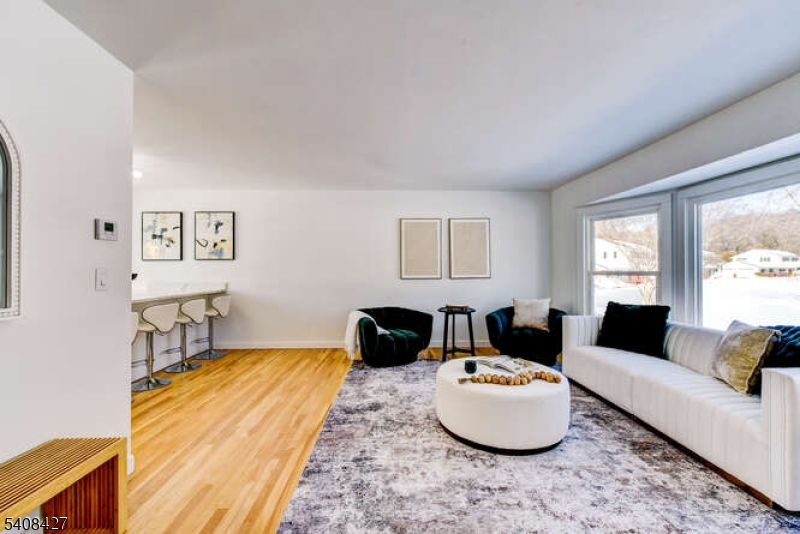 22 Glen Road Bridgewater, NJ 08805 - Photo 13 of 48 a living room with furniture and a window