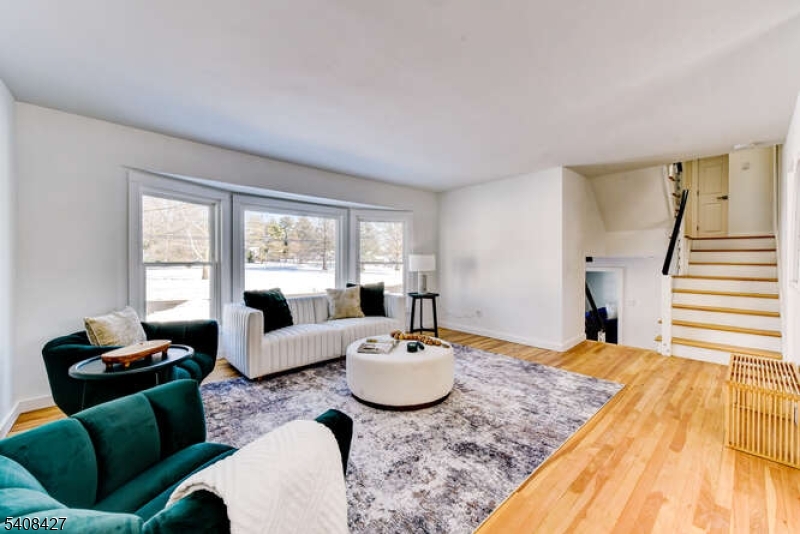 22 Glen Road Bridgewater, NJ 08805 - Photo 16 of 48 a living room with furniture and a large window