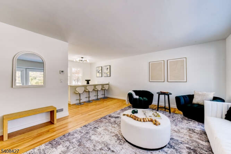 22 Glen Road Bridgewater, NJ 08805 - Photo 19 of 48 a living room with furniture and wooden floor