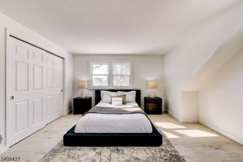 22 Glen Road Bridgewater, NJ 08805 - Photo 31 of 48 a bedroom with a large bed and a window