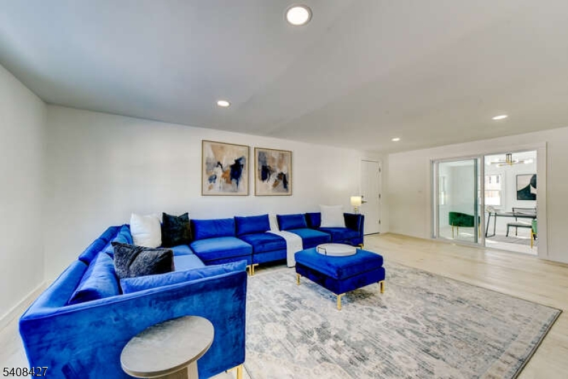 22 Glen Road Bridgewater, NJ 08805 - Photo 4 of 48 a living room with furniture and a wooden floor