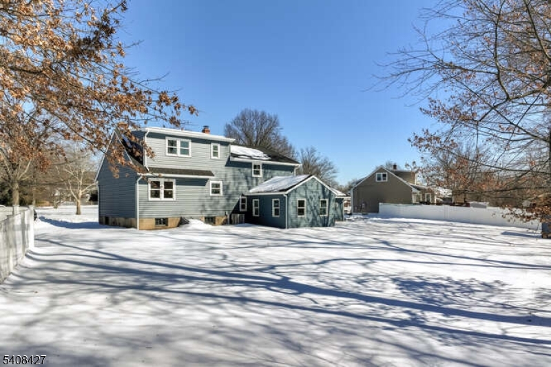 22 Glen Road Bridgewater, NJ 08805 - Photo 42 of 48 a view of a house with a snow in the background