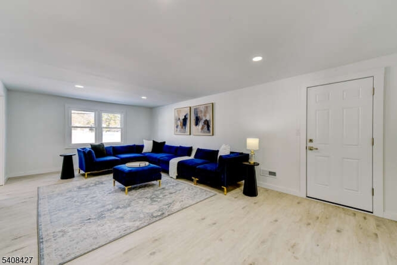 22 Glen Road Bridgewater, NJ 08805 - Photo 6 of 48 a living room with furniture a window and a couch